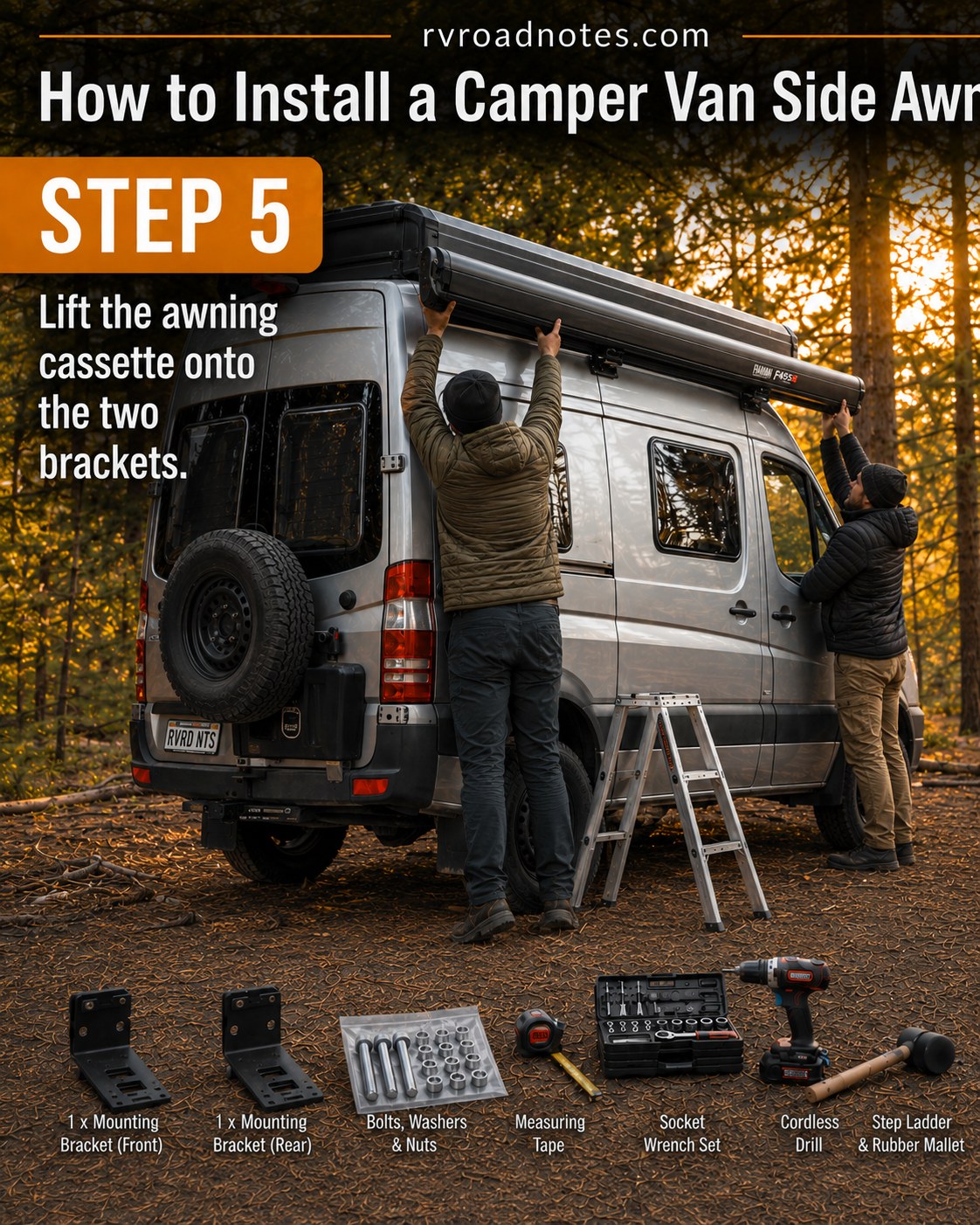 Two people lifting a heavy awning cassette onto brackets mounted on a 4x4 camper van conversion