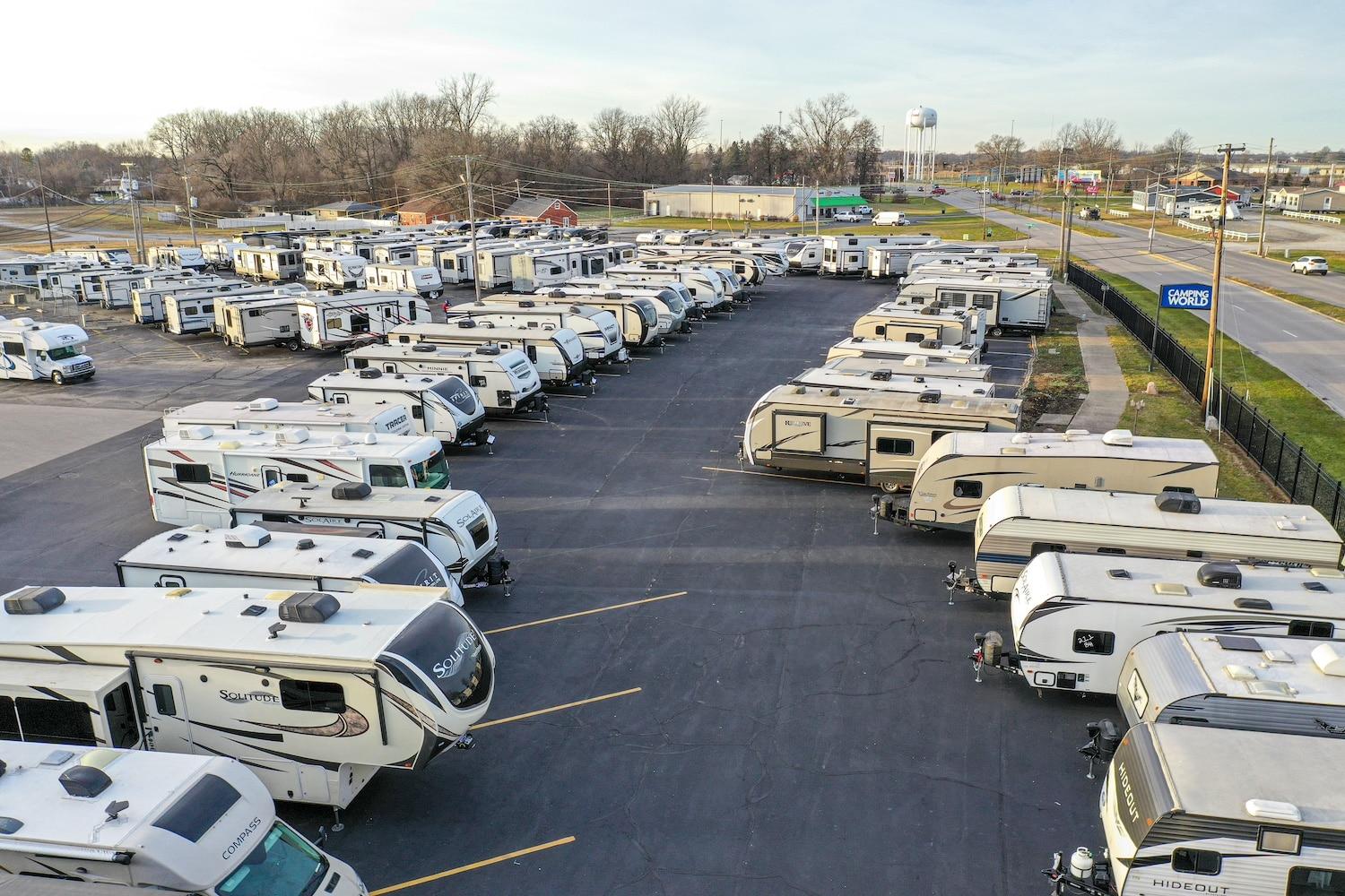 RV auction lot with older campers