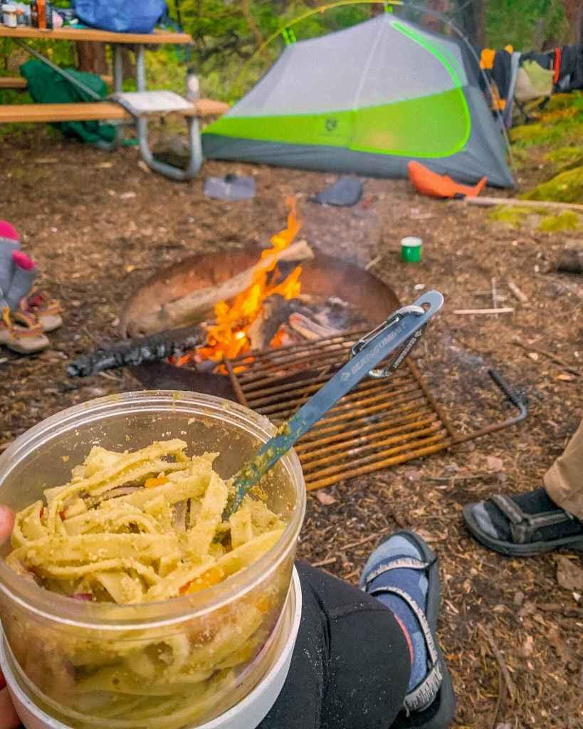 Creamy pesto chicken pasta outdoors