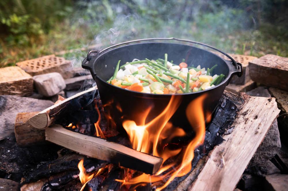 Dutch oven cooking over fire