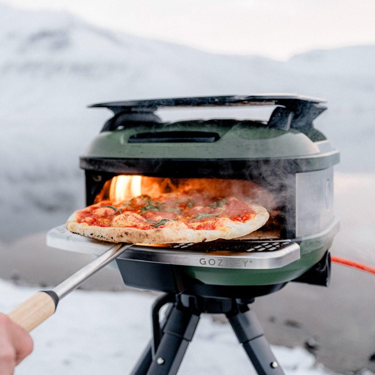 Outdoor camping pizza cooking