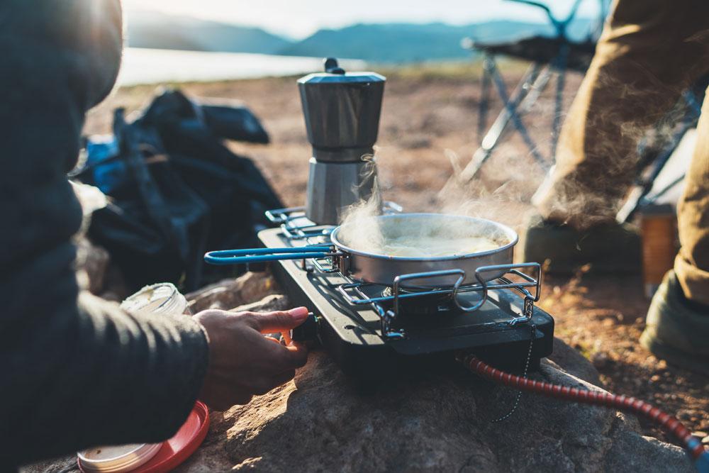 Portable stove cooking setup for dry camping meals without hookups