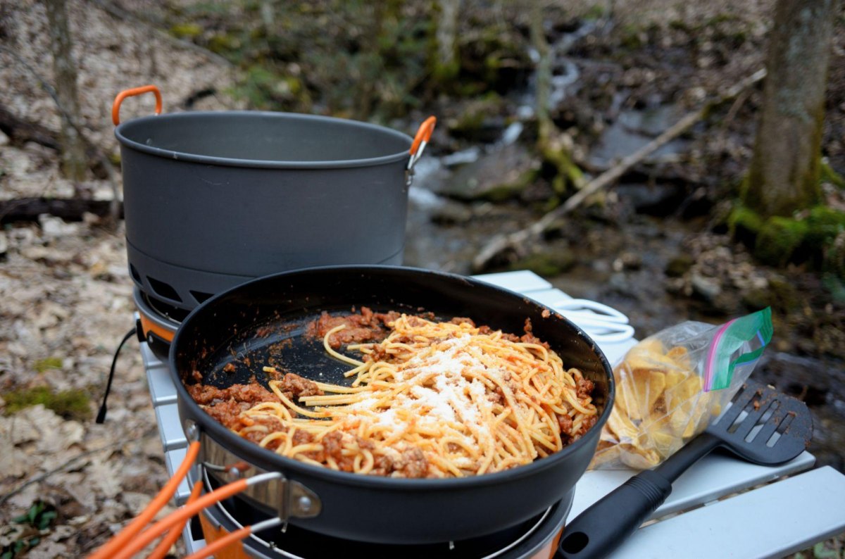 Outdoor camping pasta meal preparation