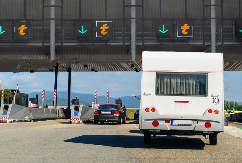 Motorhome approaching a highway toll plaza